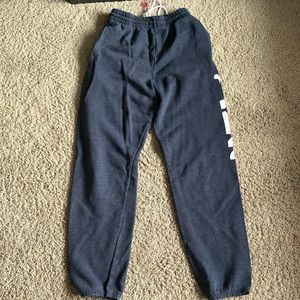 Small adult grey sweatpants with writing on the side(removable)